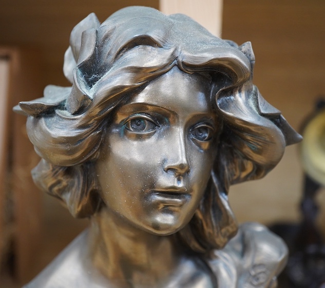 An Art Nouveau style bronzed bust of a lady on marble base, 34cm. Condition - fair